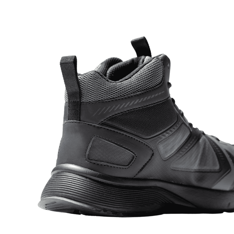 Sporty black trainer with breathable mesh and sturdy sole for outdoor activities.