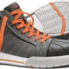 Stoere skate sneakers met oranje veters en waterdichte cap beschermkap. Geschikt voor buitenactiviteiten en stijlvol comfort.