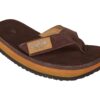 Sandal for outdoor activities with comfortable sole and sturdy strap.