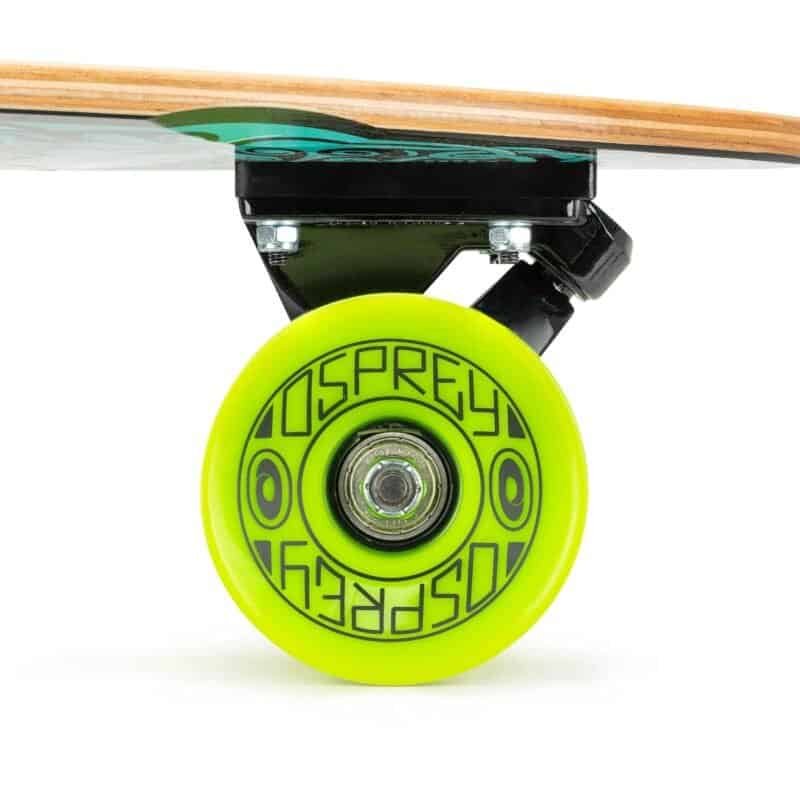 Colourful skate wheels under a skateboard with wooden deck.