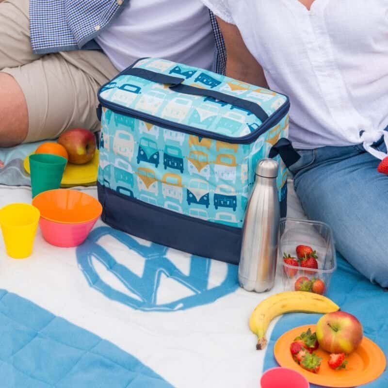Supplied cooler bag with car teeth print for picnics and outdoor activities.