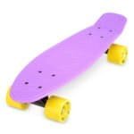 Colourful skateboard with pink deck and yellow wheels, perfect for outdoor fun and skateboard enthusiasts.