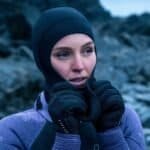 Warmtebestendige neopreen cap en handschoenen voor outdoor sporten in koude omstandigheden.