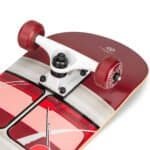 Skateboard with red wheels and graphic deck, perfect for outdoor fun and skateboarding.