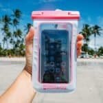 Waterproof smartphone bag for outdoor use, ideal for beaches and water sports.
