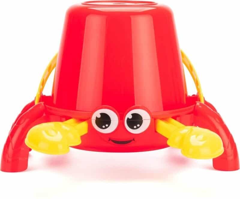 Toy shovel with happy face and yellow handles, suitable for outdoor fun.