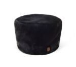 Black beanbag made of soft plush, comfortable and stylish for outdoor or indoor use.