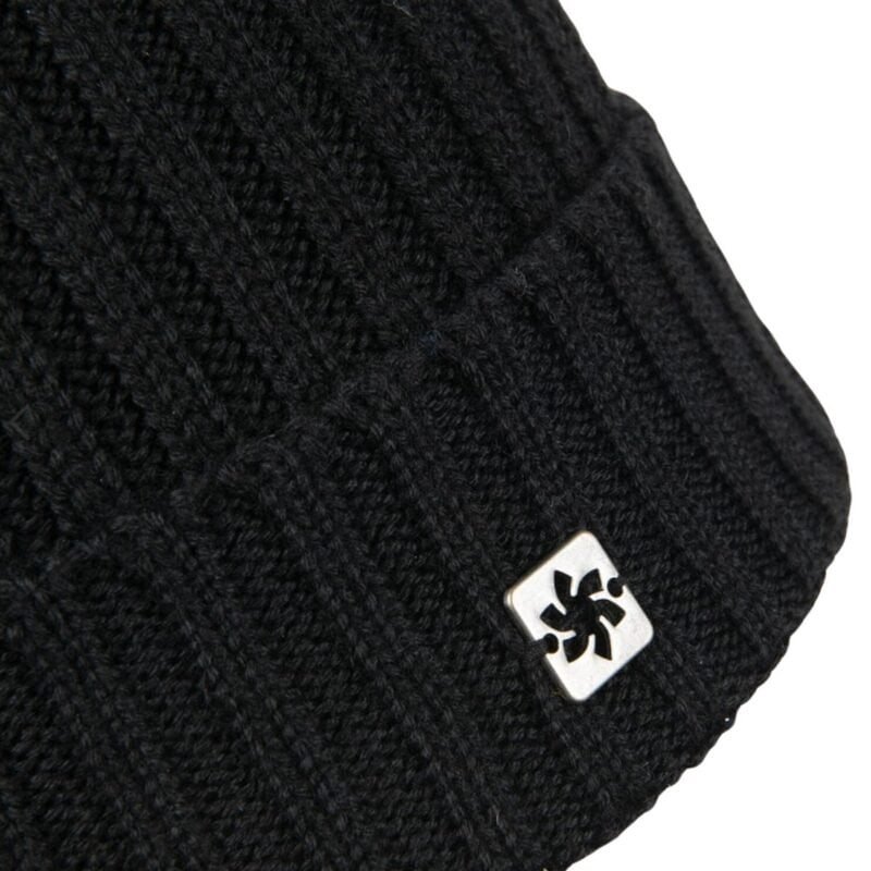 Dark knitted winter hat with small metal logo.