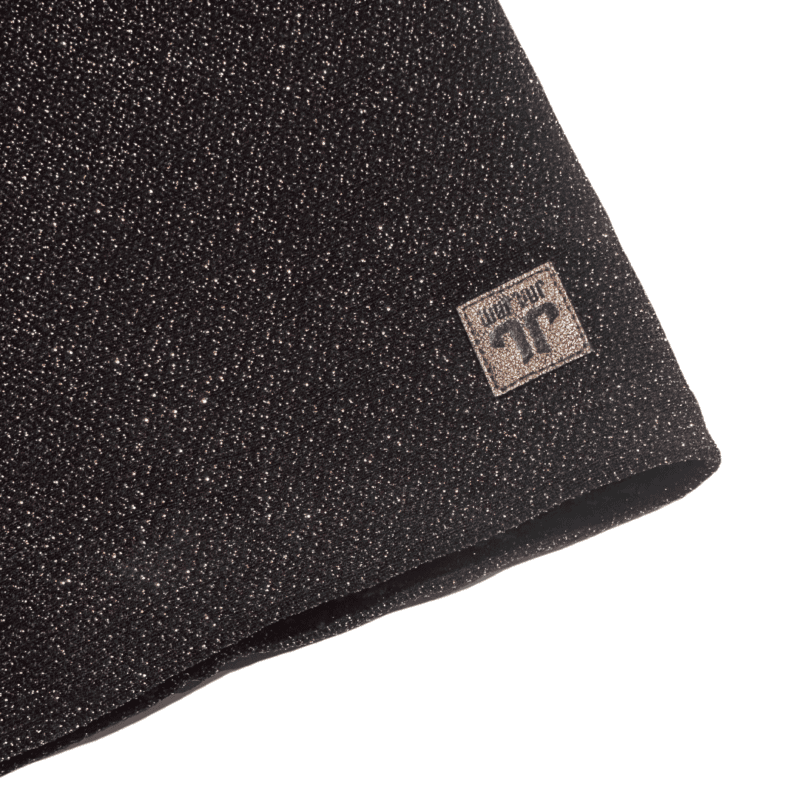 Glitzernde schwarze Skaterfedern mit Tretorn Logo.