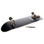 Shutterboard with black grip coating and gold trucks, including Pint Marker pen. Ideal for outdoor fun and skateboard styling.